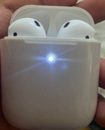 airpods blinking white when open.